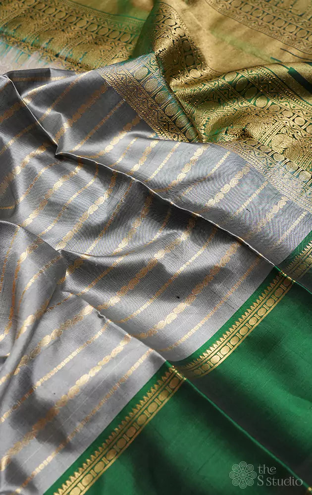Grey veldhari lines kanjivaram silk saree with reattai pet border