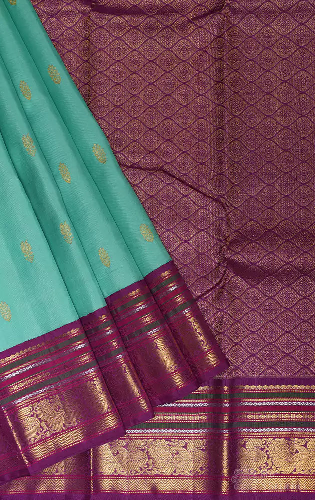 Sea green kanchipuram silk saree with varisaipet border