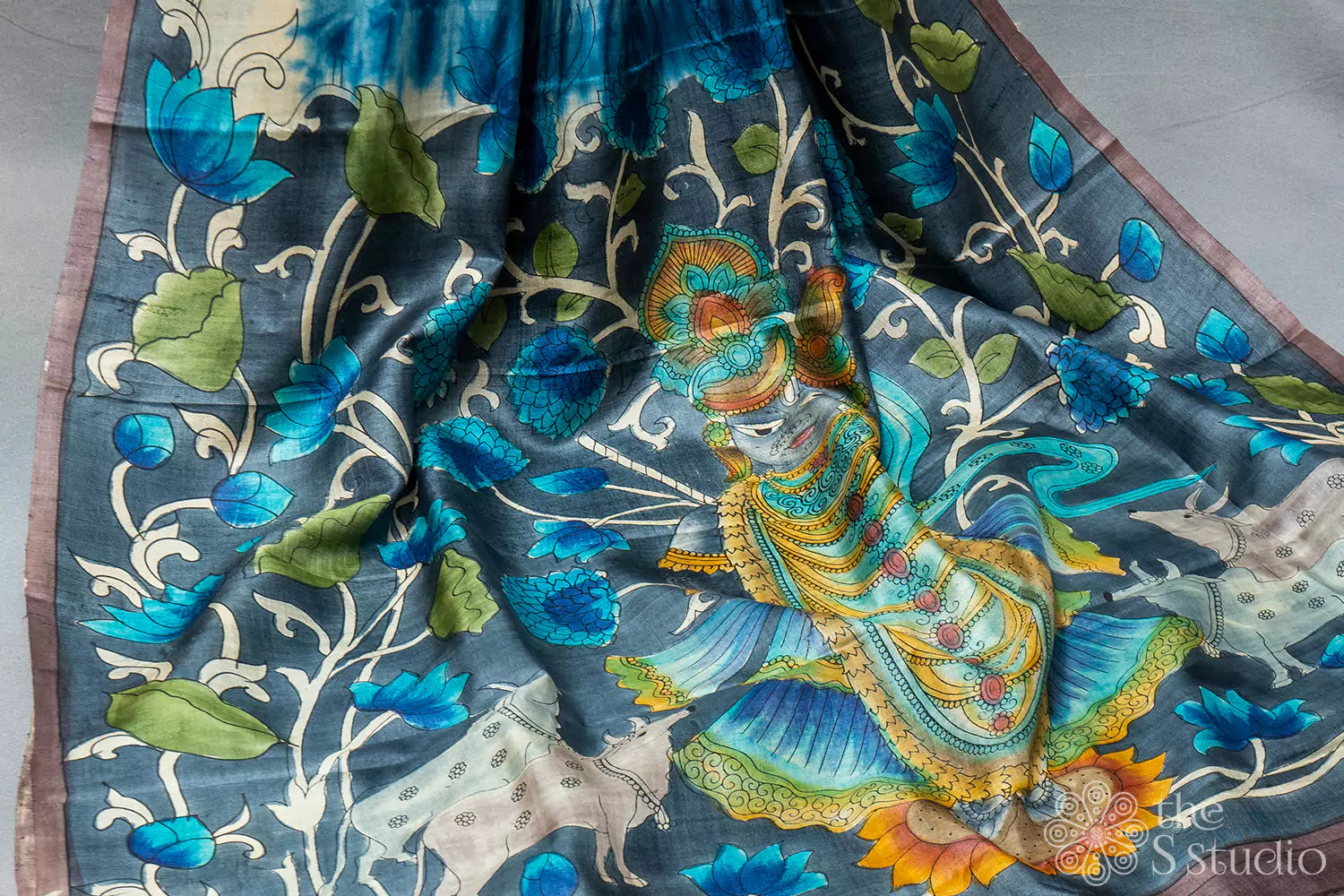Shaded blue batik and floral print tussar saree