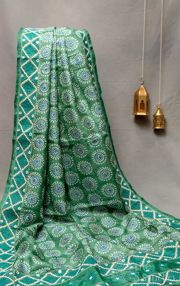 Green tussar saree with kutch embroidered border