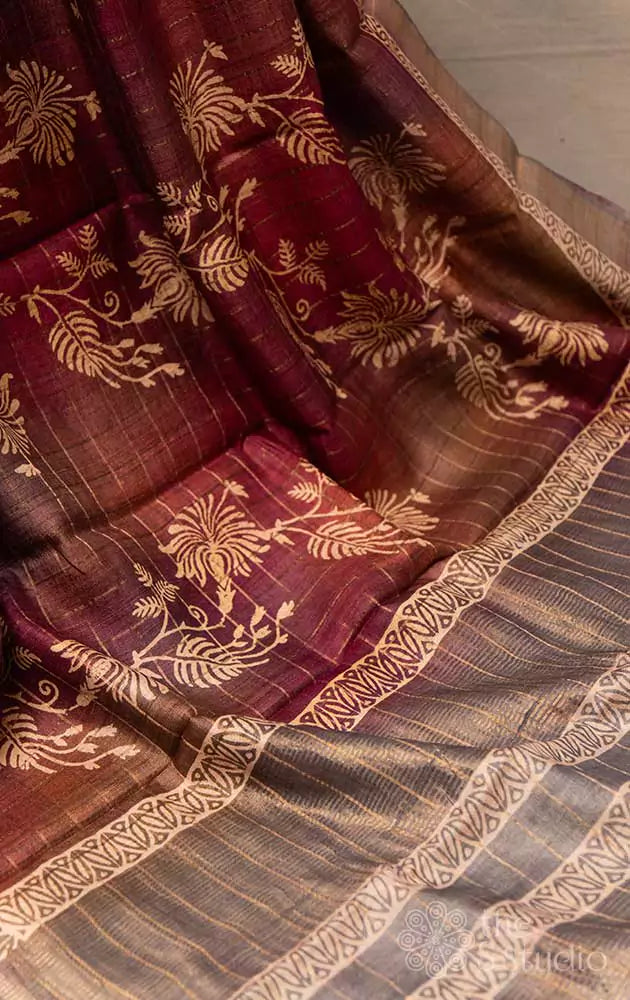 Brown and magenta zari checked tussar saree with floral prints