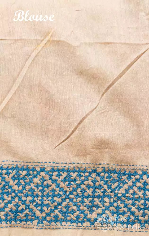 Beige printed organza saree with Kutch embroidered border