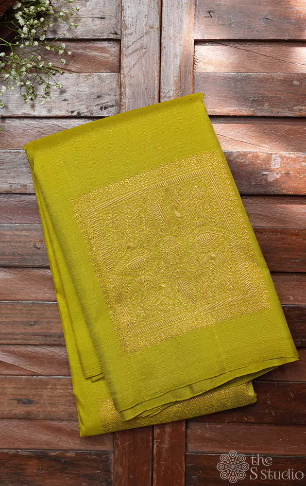 Green kanchipuram silk with square buttas