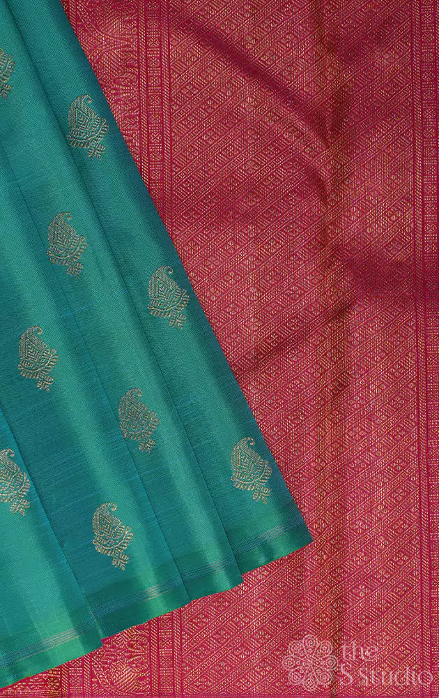 Sea green Kanchipuram silk saree with rani pink rich zari pallu