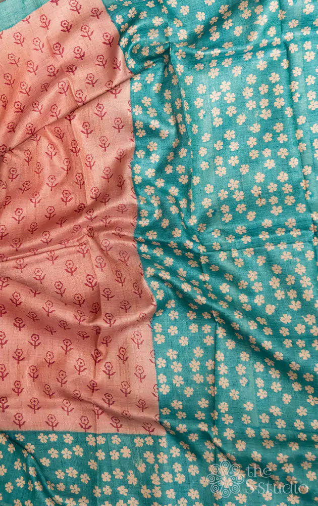 Pastel pink tussar silk saree with aqua blue floral printed border