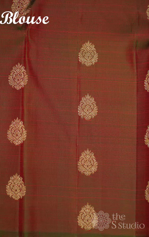 Pinkish red kanchipuram silk saree with manthulir green border