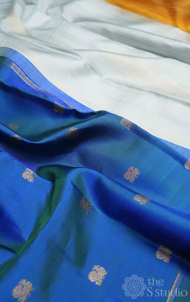 Peacock blue kanjivaram saree with double coloured pallu