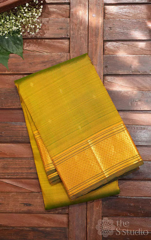 Manthulir green kanchipuram silk sareee with mustard zari border