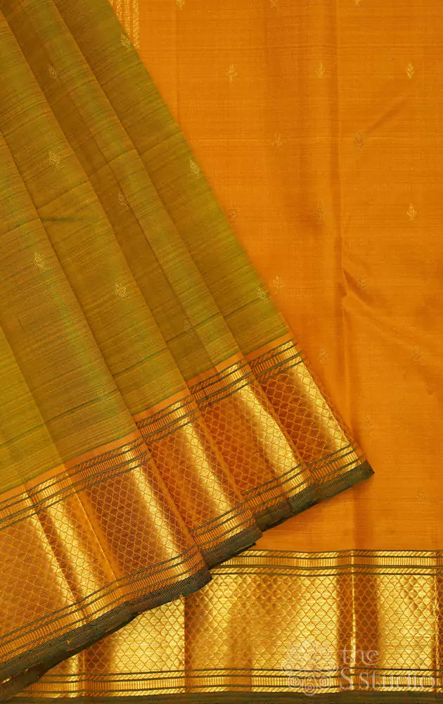 Manthulir green kanchipuram silk sareee with mustard zari border