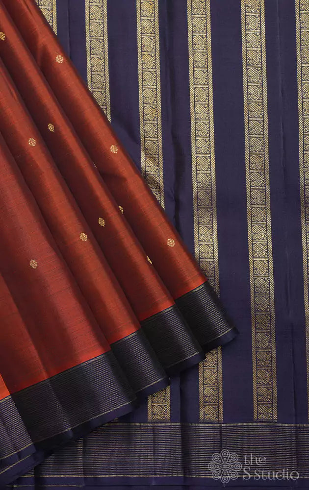 Rust kanjivaram saree with small blue border