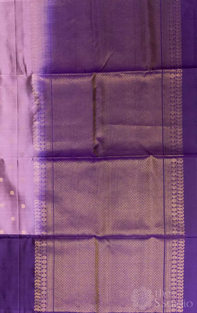 Light violet soft silk saree with paisley buttas border
