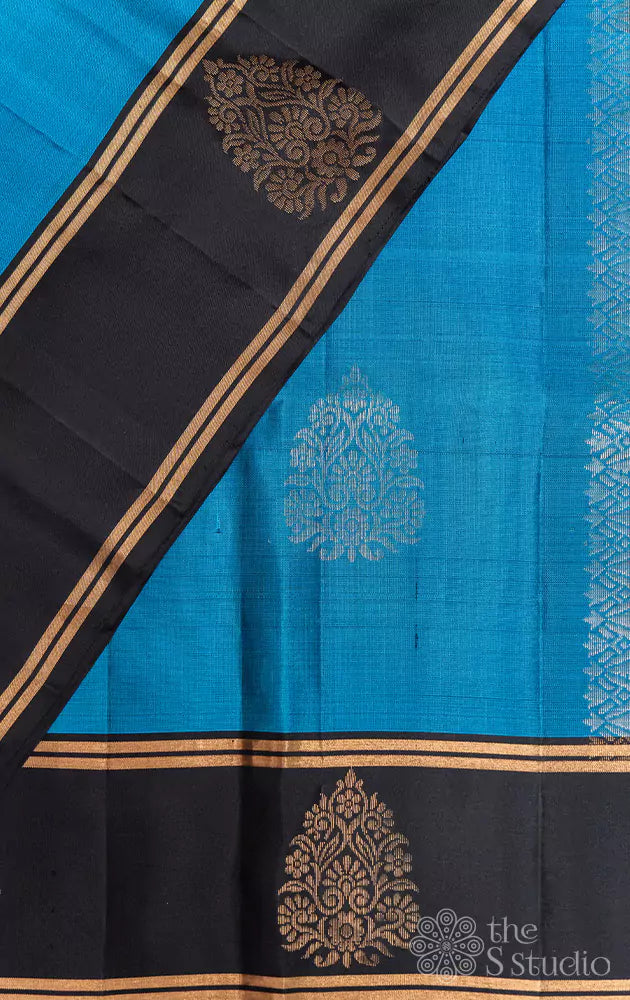 Blue soft silk saree with small black border