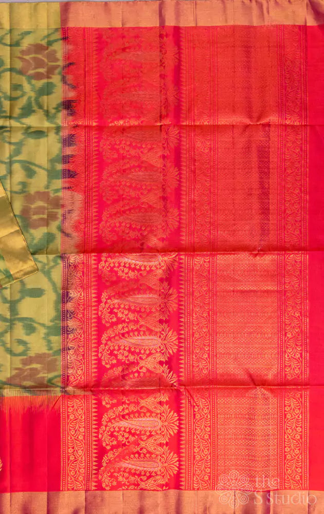 Pastel green soft silk ikkat saree with orangish pink pallu