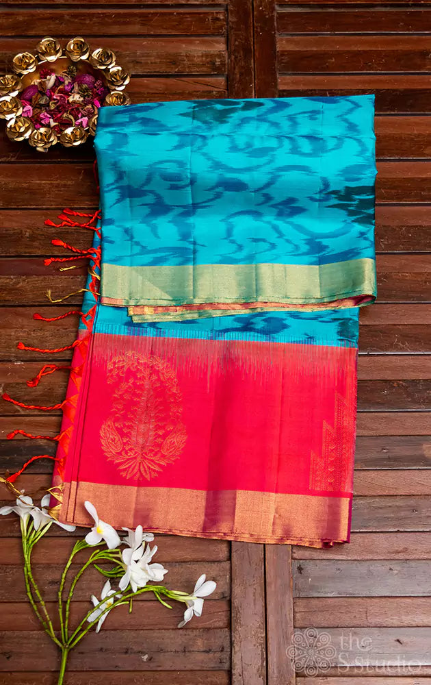 Light blue ikat soft silk  saree with peach border and pallu 