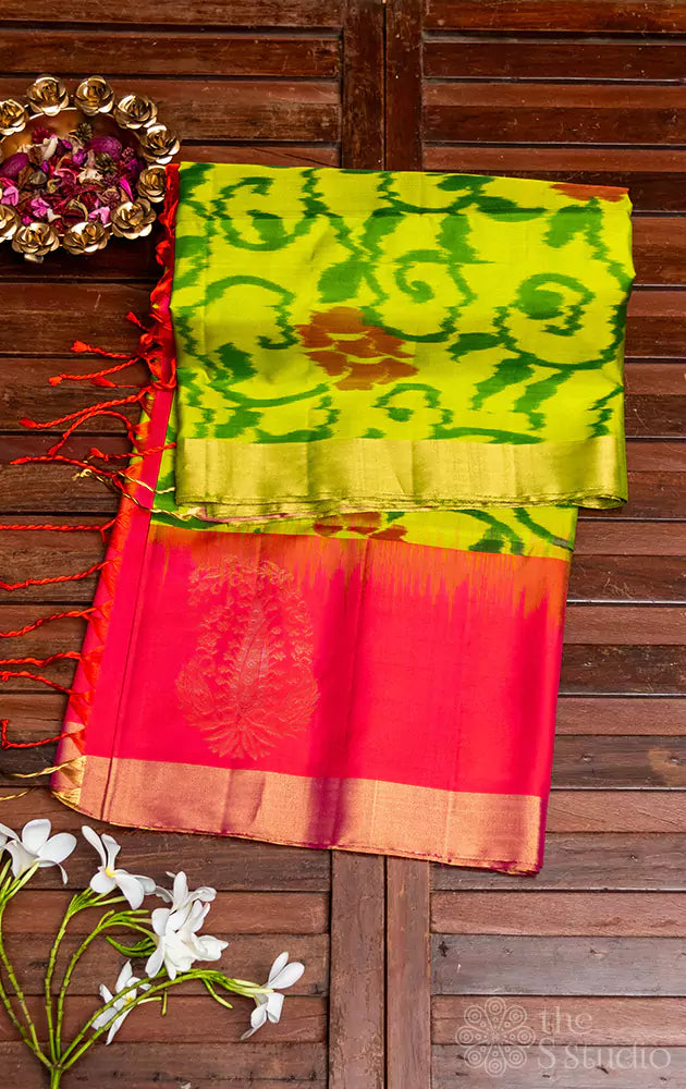 Pastel green ikat soft silk  saree with peach border and pallu