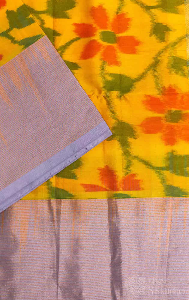 Yellow ikkat soft silk saree with grey zari lined border