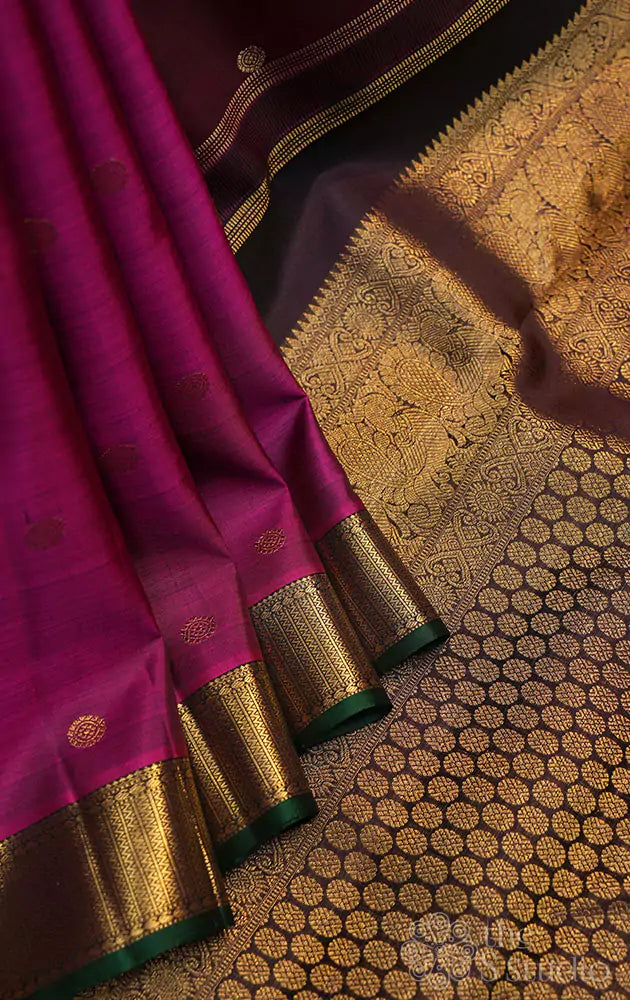 Deep magenta kanjivaram saree with small brown border