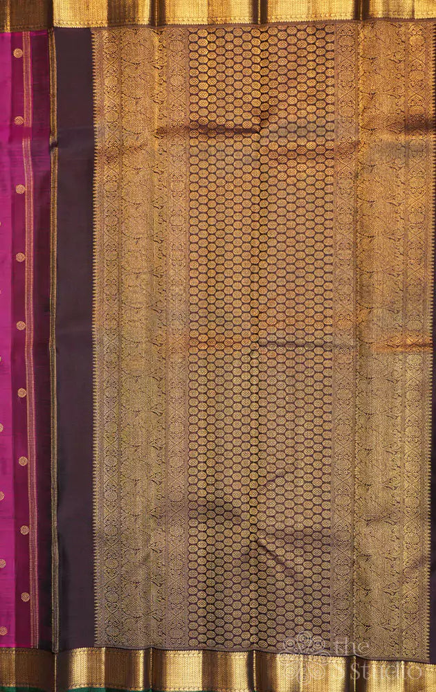 Deep magenta kanjivaram saree with small brown border