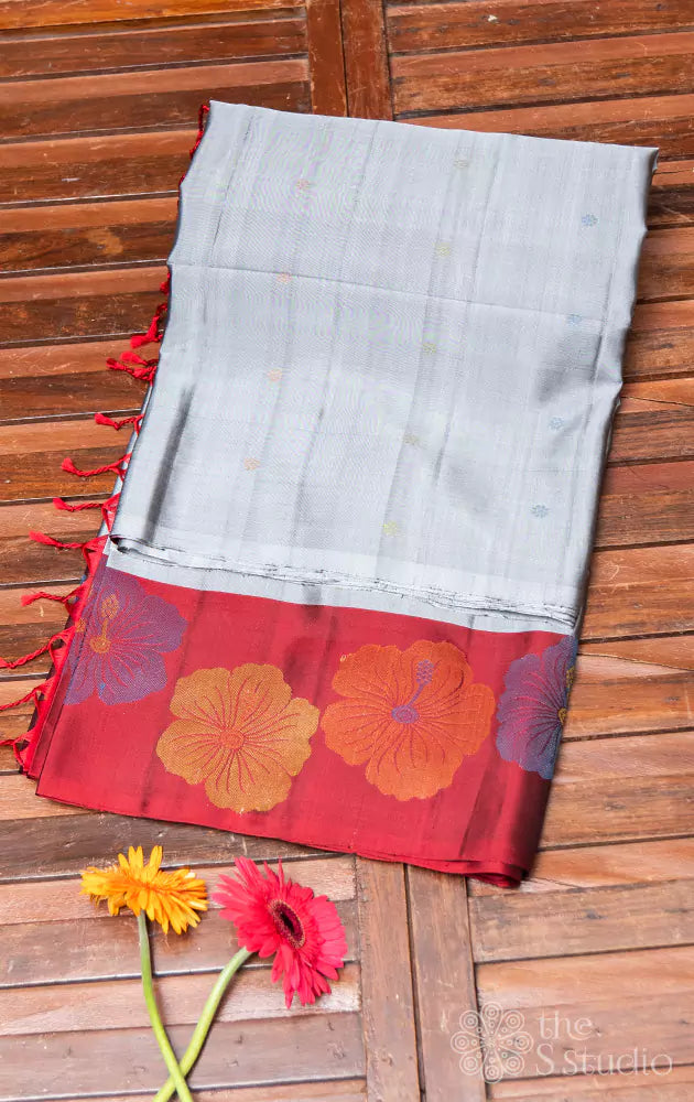 Grey soft silk saree with contrast maroon border woven with floral motifs