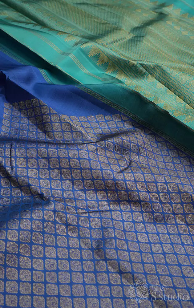 Cerulean blue kanchi silk saree with woven zari motifs