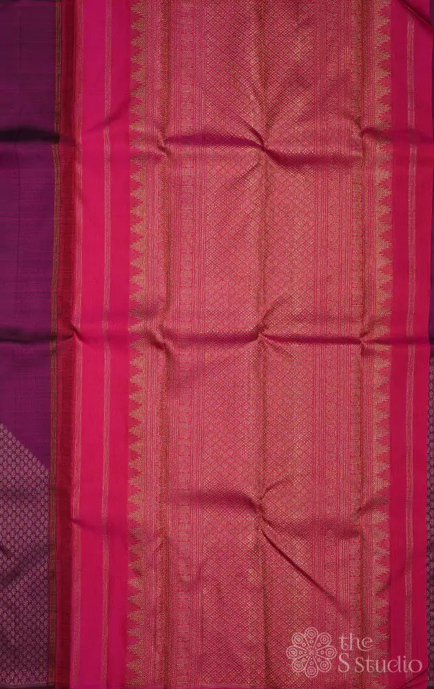 Magenta kanjivaram saree with buttas and contrast pallu