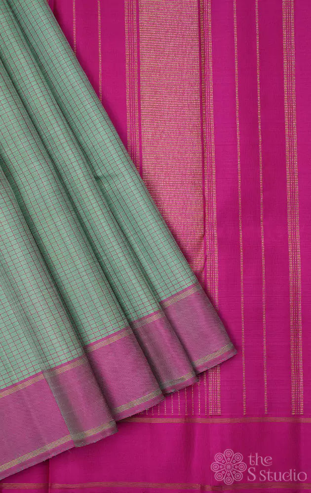 Mint green kanchi silk saree with pink border