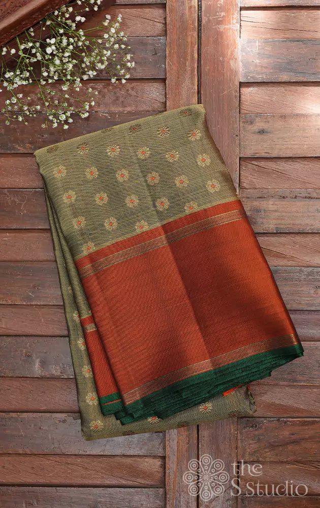 Methi green golden kanchi silk saree with contrast orange border and pallu