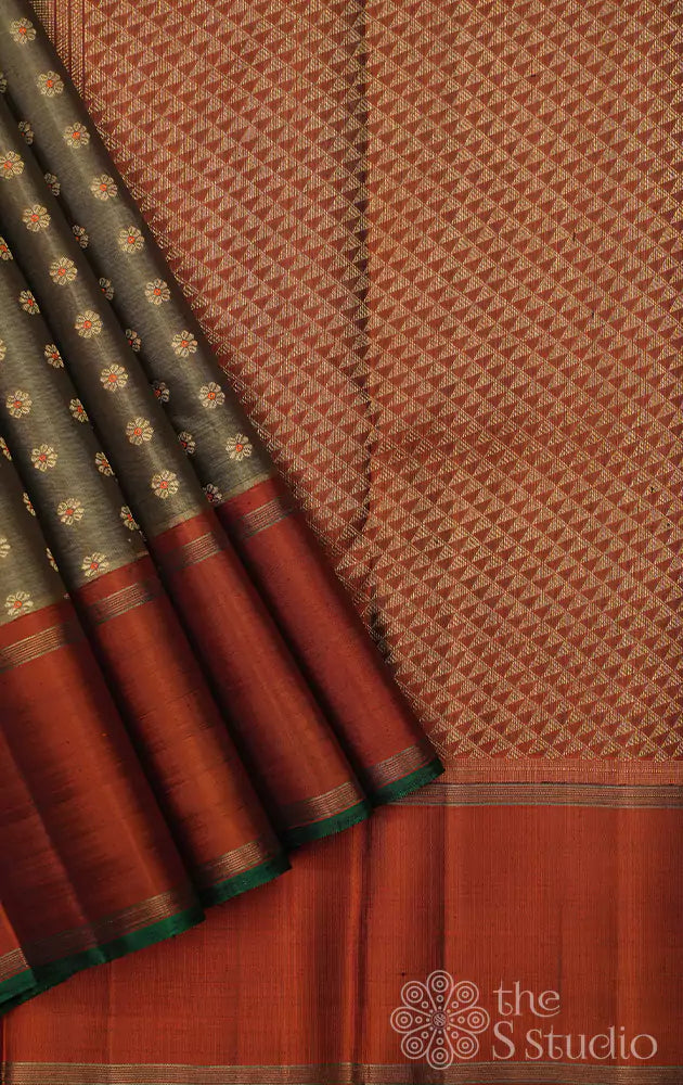 Methi green golden kanchi silk saree with contrast orange border and pallu