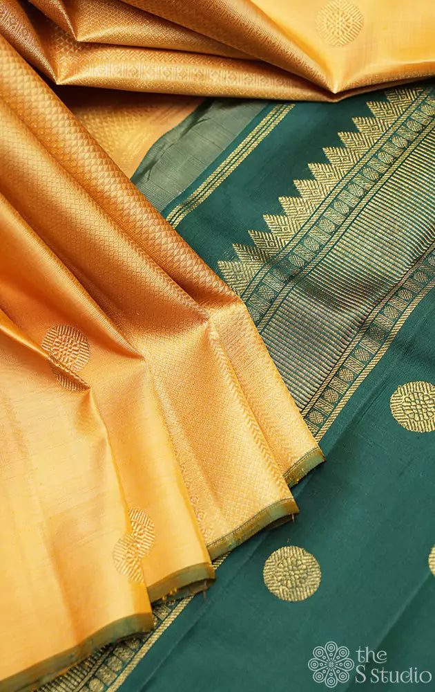Golden beige kanchi silk partly pallu saree