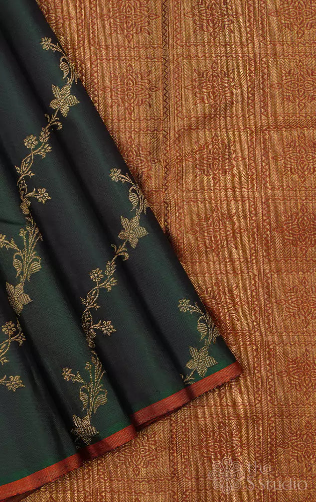 Green with zari floral veins  kanchi silk saree and a rust pallu