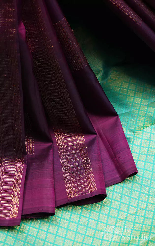 Plum coloured kanchi silk saree with aqua blue pallu