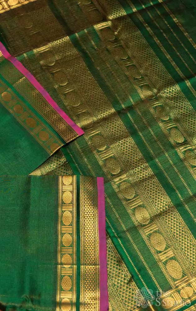 Green vairaoosi silk cotton saree with rani pink border