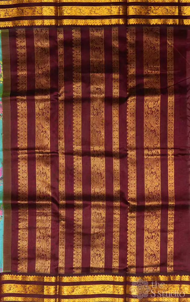 Sea green silk cotton saree with block print and brown border