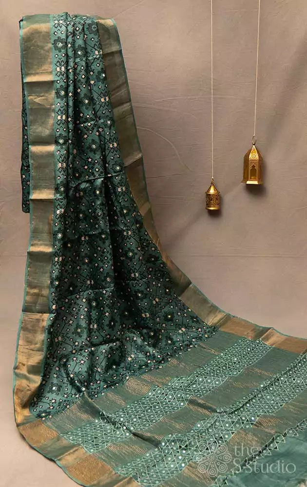 Green patola printed tussar saree with cutwork pallu