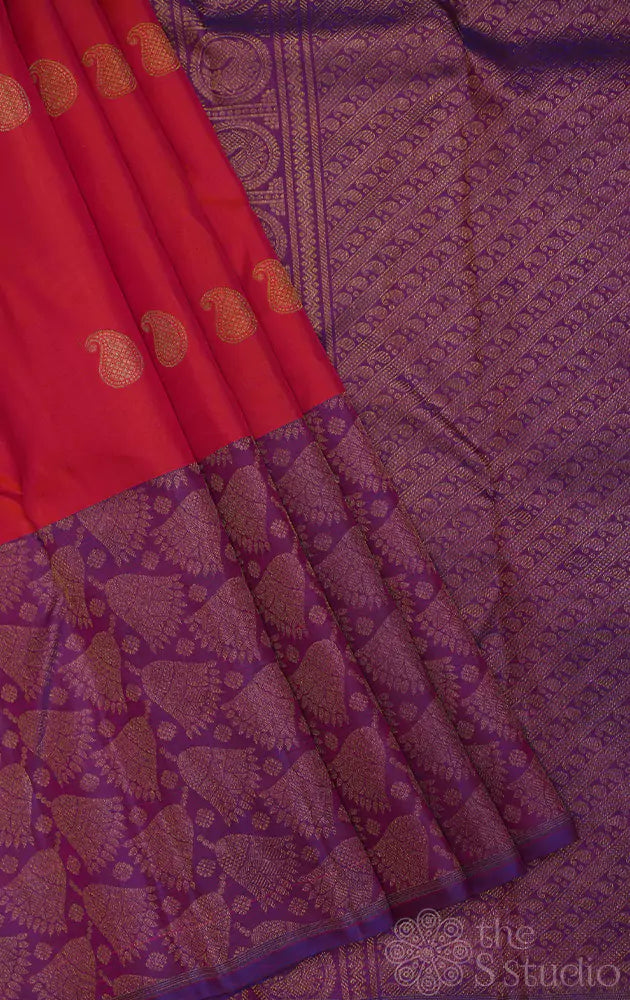 Peach kanjivaram saree with korvai purple border