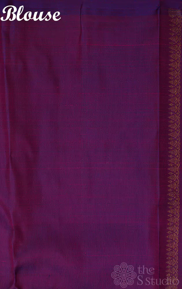 Peach kanjivaram saree with korvai purple border