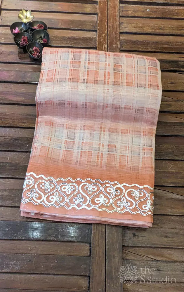 Peach tissue semi silk embroidered saree
