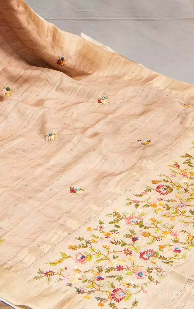 Light brown tussar saree with hand embroidery