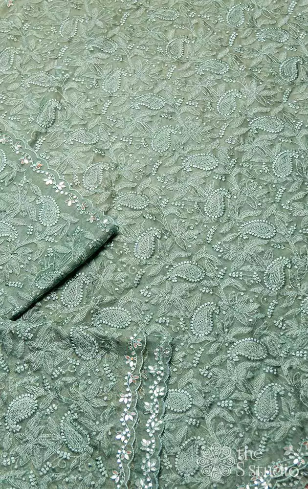 Pine green embroidered organza saree with scallop border