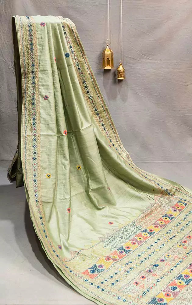 Pastel green tussar saree with multi colour hand embroidery