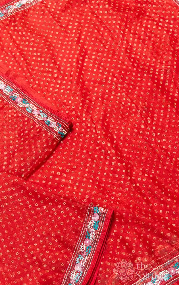 Maroon organza saree with bandhani prints and embroidery border