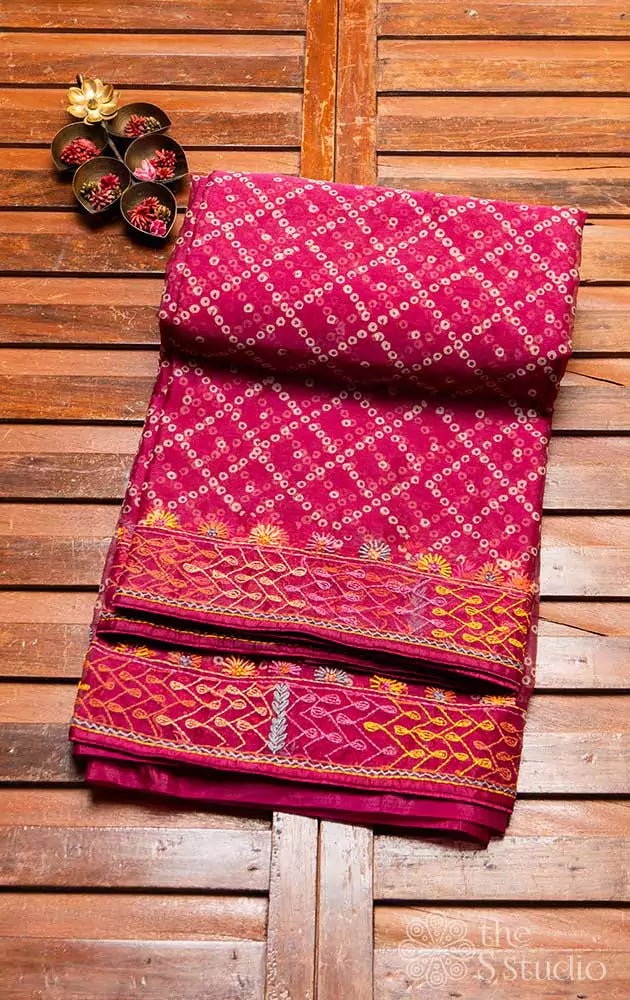 Magenta organza saree with bandhani prints and embroidery border
