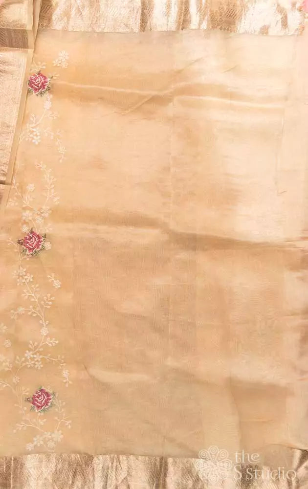 Off white organza saree with all over embroidery  and zari border