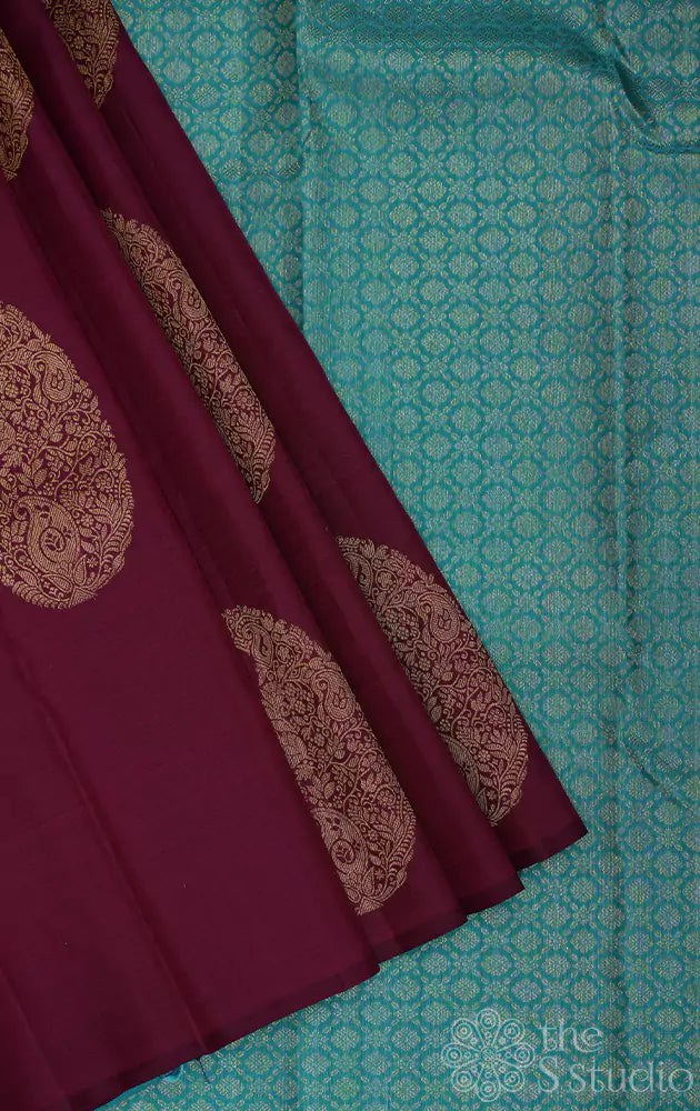 Purple kanchipuram silk saree with woven paisley zari motifs