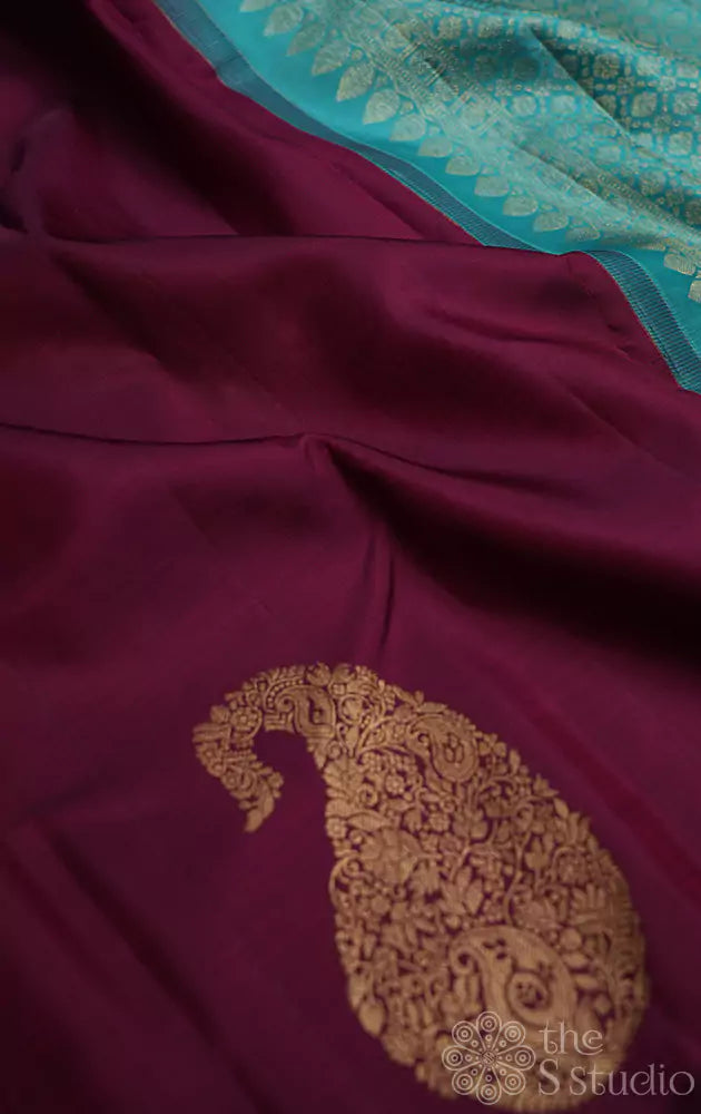 Purple kanchipuram silk saree with woven paisley zari motifs