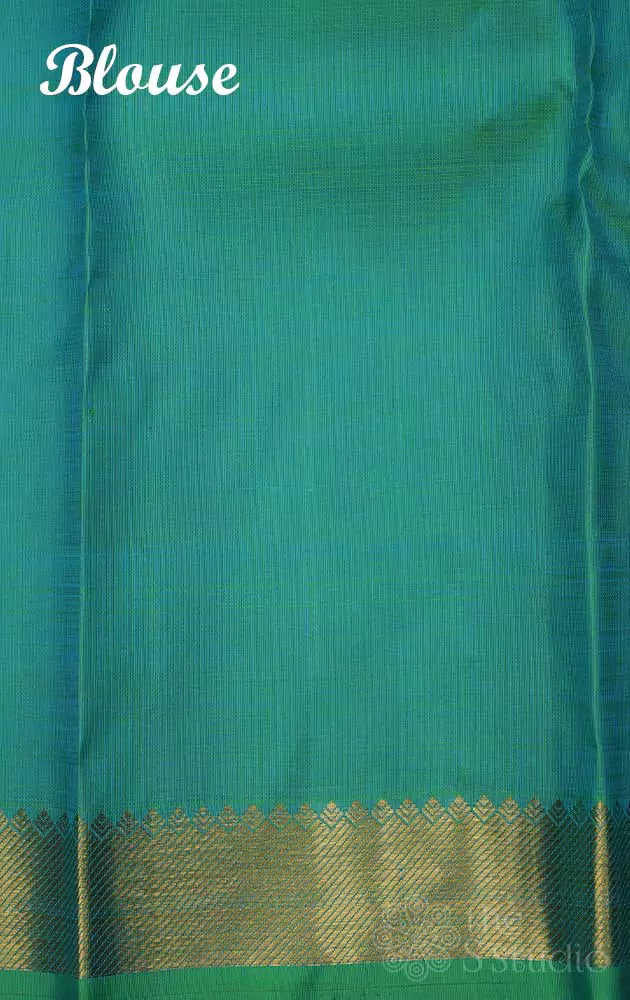 Orange kanchipuram silk saree with small buttas
