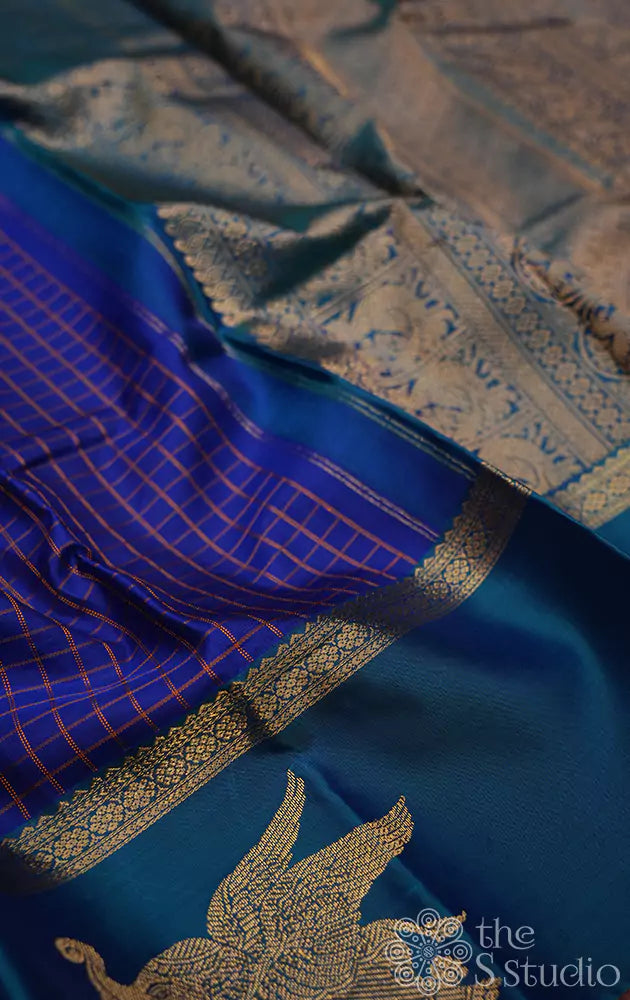 Royal blue kanchi silk saree with elephant motifs border