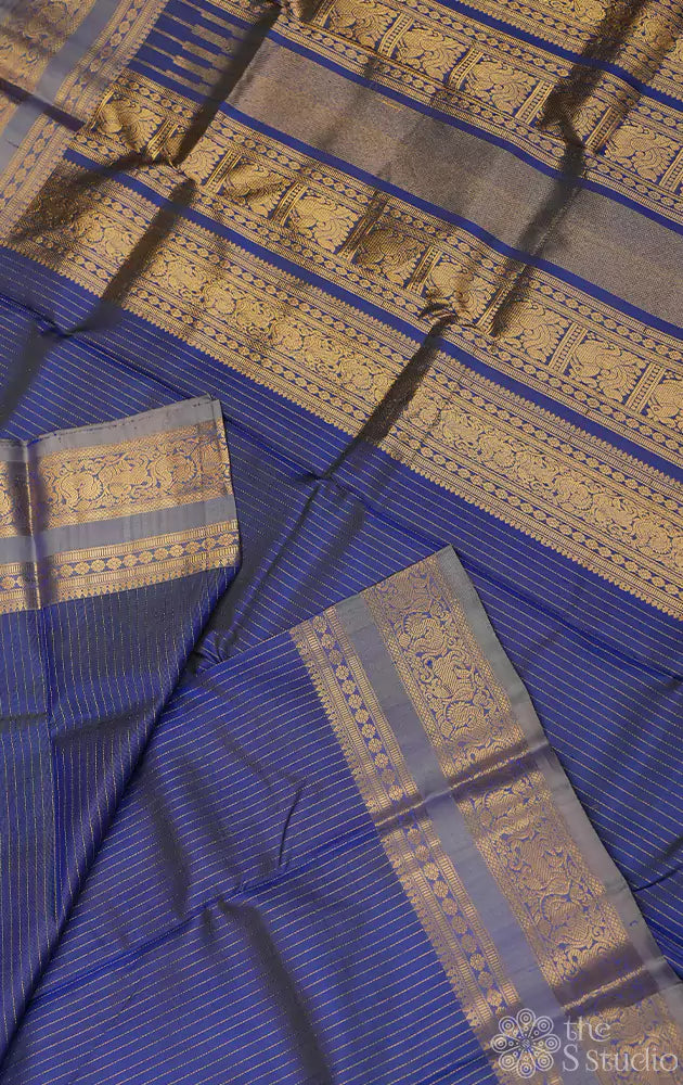 Powder blue kanchipuram silk saree with zari vertical lines and grey border