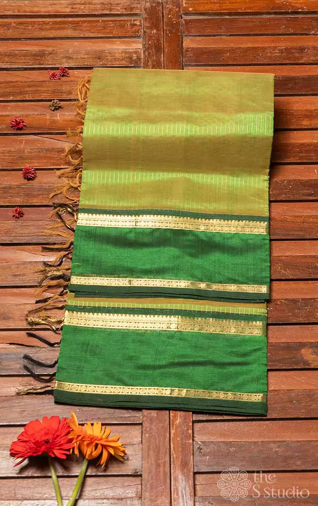 Light green silk cotton saree with dark green border