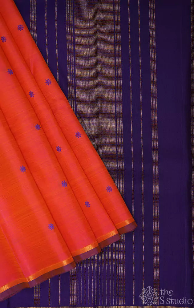 Peach kanchipuram silk saree with thread buttas and contrast blue pallu